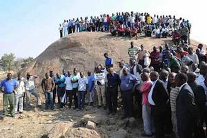 Picture credit: Miners at the site of the Marikana massacre courtesy Socialist Worker UK.